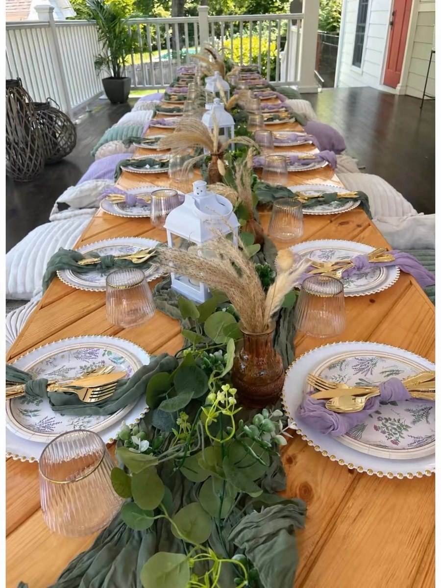Purple and green luxury picnic with low table and place settings