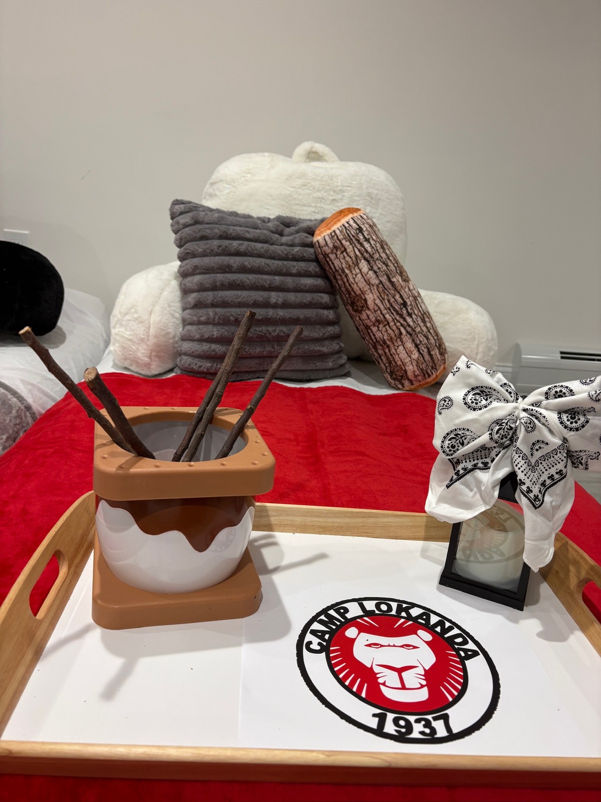 Camp-inspired tentless mattress details with a themed tray