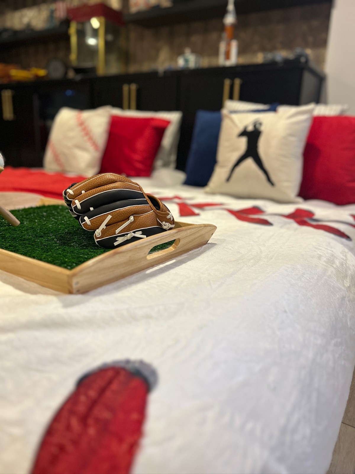 Baseball-inspired mattress details with a glove and styled tray